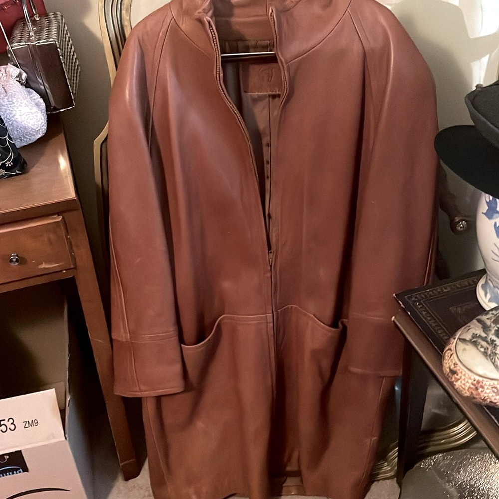 Woman’s leather coat knee length brown